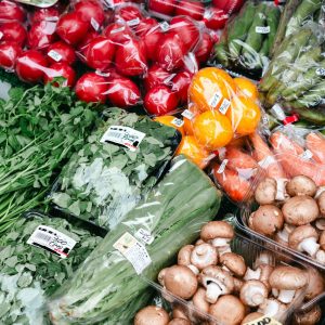 Fresh organic vegetables displayed at Tokyo farmers market, showcasing agricultural diversity.
